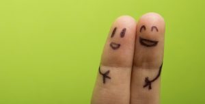 two smiling fingers that are very happy to be friends