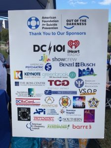 Sign showing that TCG was a sponsor of the American Foundation for Suicide Prevention Out of the Darkness Walk.